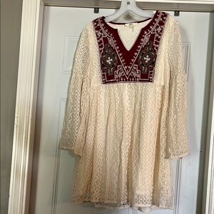 Elegant Cream Lace Dress with Red Embroidery
